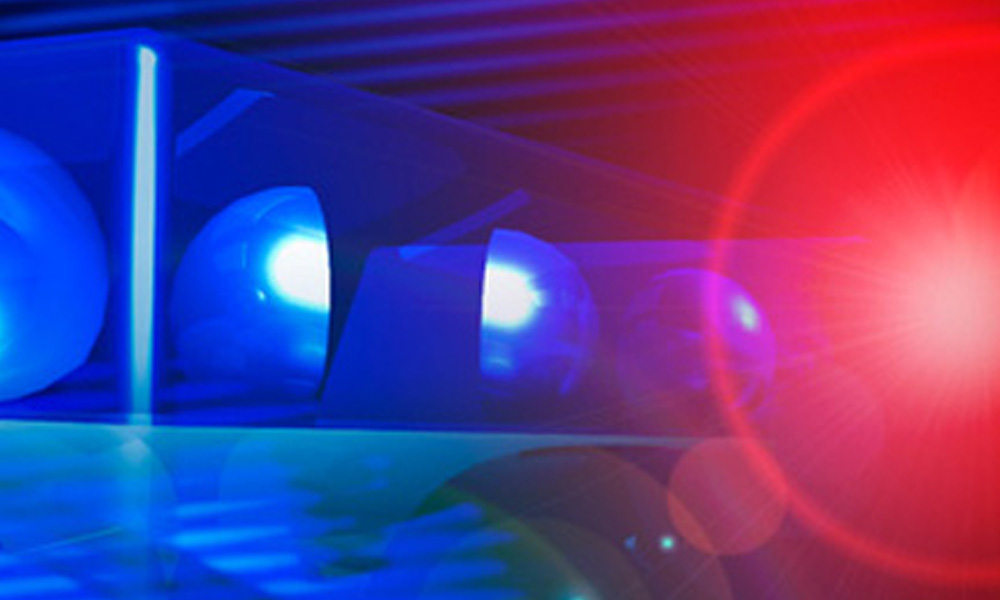 Abstract image featuring blue neon lights and reflective spheres with a prominent red lens flare effect on the right side, symbolizing the vigilant eye of a vet.