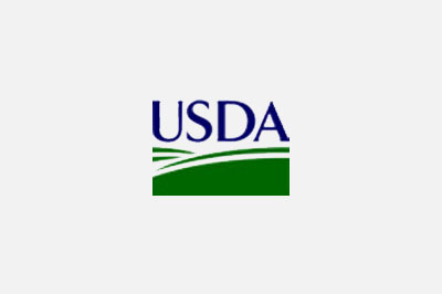 Logo of the United States Department of Agriculture (USDA) featuring bold blue letters and a stylized green field under a grey sky, symbolizing their collaboration with veterinarians.