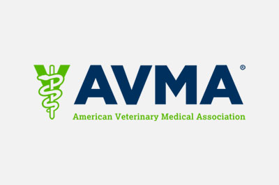 Logo of the American Veterinary Medical Association (AVMA), featuring a green caduceus symbol next to the acronym "AVMA" in bold blue letters, with the full name underneath.