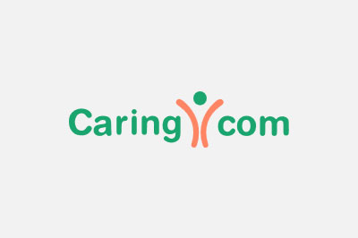 Logo of caring.com featuring the word "caring" in green text with a stylized orange figure forming the dot above the letter 'i' followed by ".com" in green, symbolizing veterinarian care.